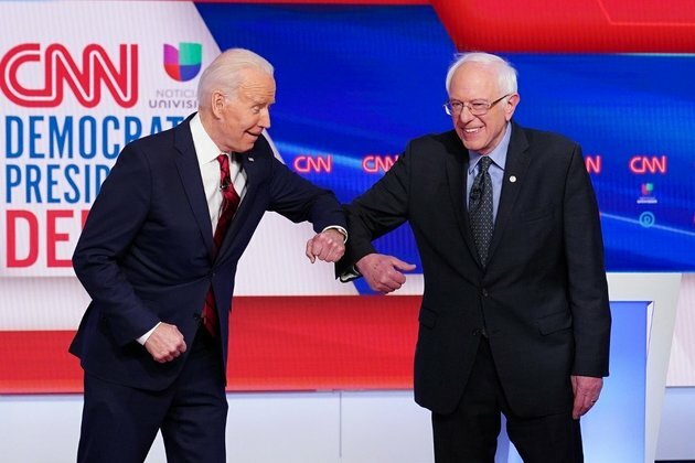 Biden, Sanders go virtual as virus freezes US Democratic race