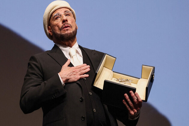 John Travolta receives surprise Honorary Palme d'Or at Cannes 2026