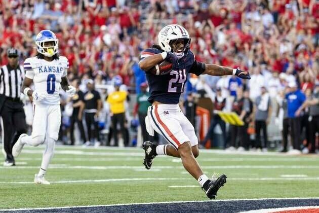 Arizona's TD in final minute drops Kansas, earns bowl eligibility