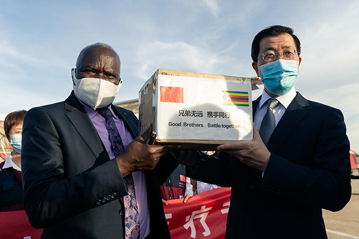  imbabwe inister of ocal overnment and ocial elfare uly oyo  with the hinese ambassador uo haochun  as they speak to the press on ay 11 2020 during the welcome ceremony held for a team of health experts from hina that will help with the fight against the 19 coronavirus at the obert ugabe nternational irport in arare hoto by ekesai   