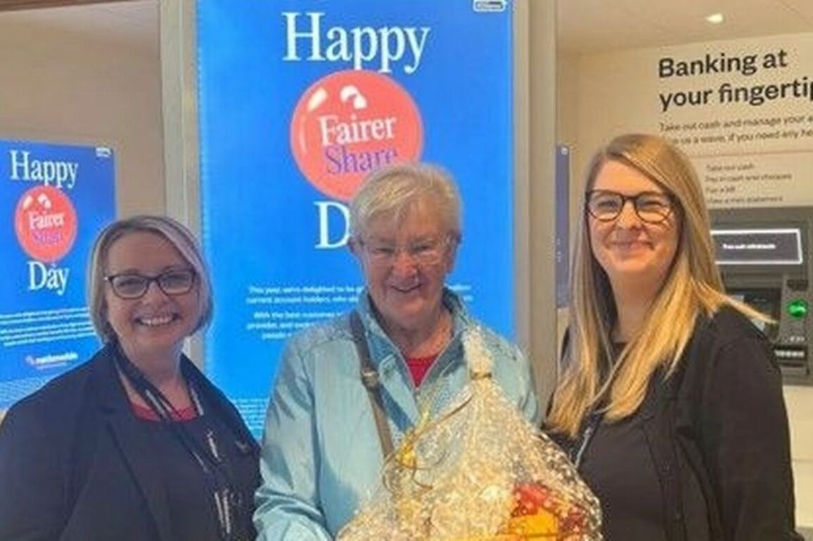 Nationwide East Kilbride fundraiser coins in cash for dementia specialist nurses