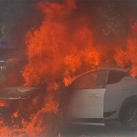 Car catches fire on Delhi's MB Road amid intense heat, two escape safely