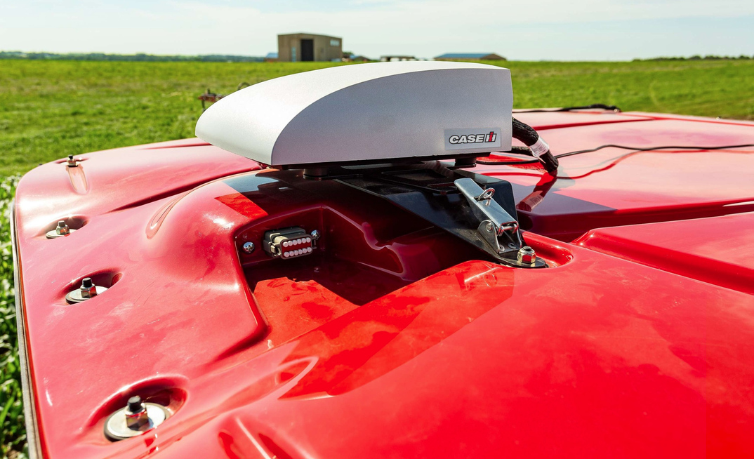 CNH's RS1 receiver is part of a new system to enable older Case IH and New Holland machinery to use better positioning technology.