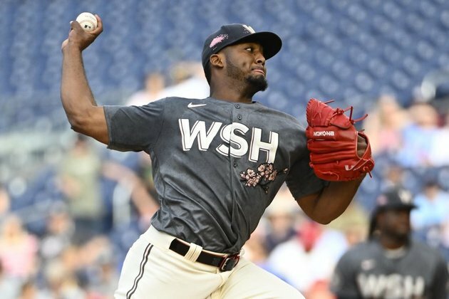 Rockies clip Nationals to earn split of twin bill