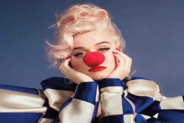 Katy Perry wears clown nose in new album cover of 'Smile'