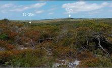  View to the southeast showing the undulating Si2 terrain and approximate thickness of dunes, with typical vegetation coverage. The field of view is about 3km wide.