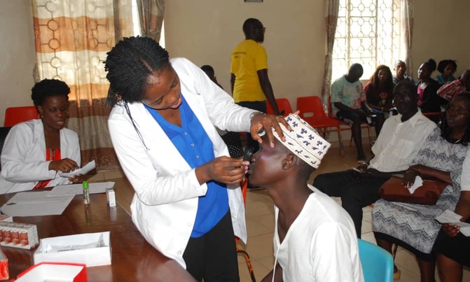 Lions in a free eye screening and treatment camp Lions in a free eye screening and treatment camp