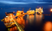 The large offshore oil rig at night with twilight_credit_Shutterstock_num_skyman