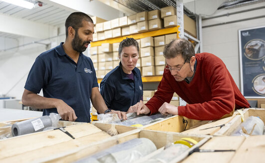 BGS geologists studying the core in the National Geological Repository