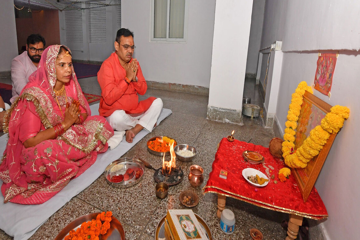 Rajasthan CM Bhajanlal Sharma lights lamp at his residence during Diwali