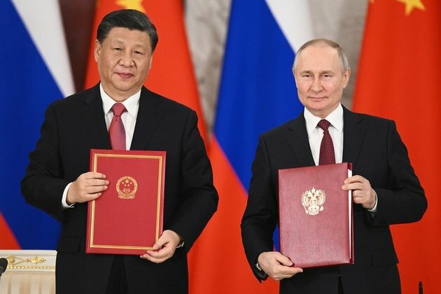 Multiple agreements crown historic Putin-Xi meeting