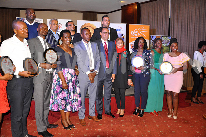  he inister of rade melia yambadded 3rd left poses for a group photograph with other winners 