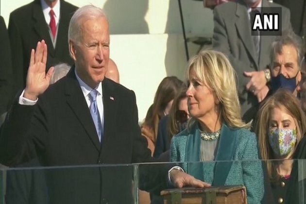 US stocks hit record highs as Biden's presidency begins