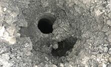 The blast hole next to a hole that contains a misfire.