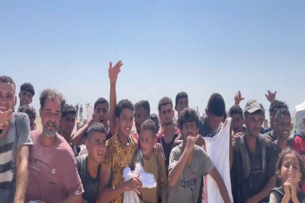 Palestinians chant "I love you Trump" as US-backed aid enters region