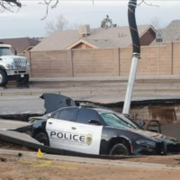 Rio Rancho Police Department cruiser falls in sinkhole