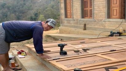 P C Henderson donates hardware to assist school rebuild in Nepal