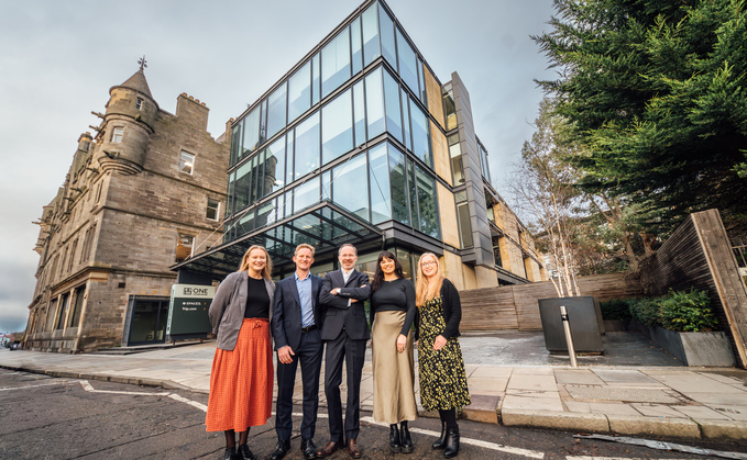 Staff outside Barnett Waddingham's Edinburgh office. Left to right: Ellie Vannan, Andrew Simpson, Craig Turnbull, Emma Milligan and Katherine Fossett