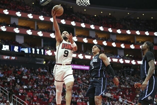 Strong defense carries Rockets past Magic
