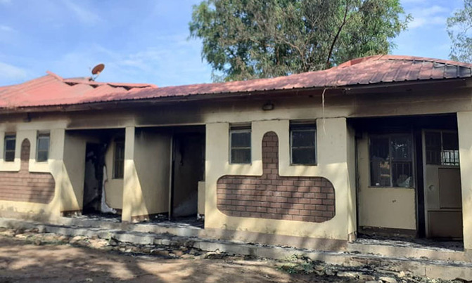 Police officers stranded as fire guts Nebbi Police station residence Police officers stranded as fire guts Nebbi Police station residence
