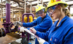 File photo: Alcoa workers busy at an aluminium production facility 