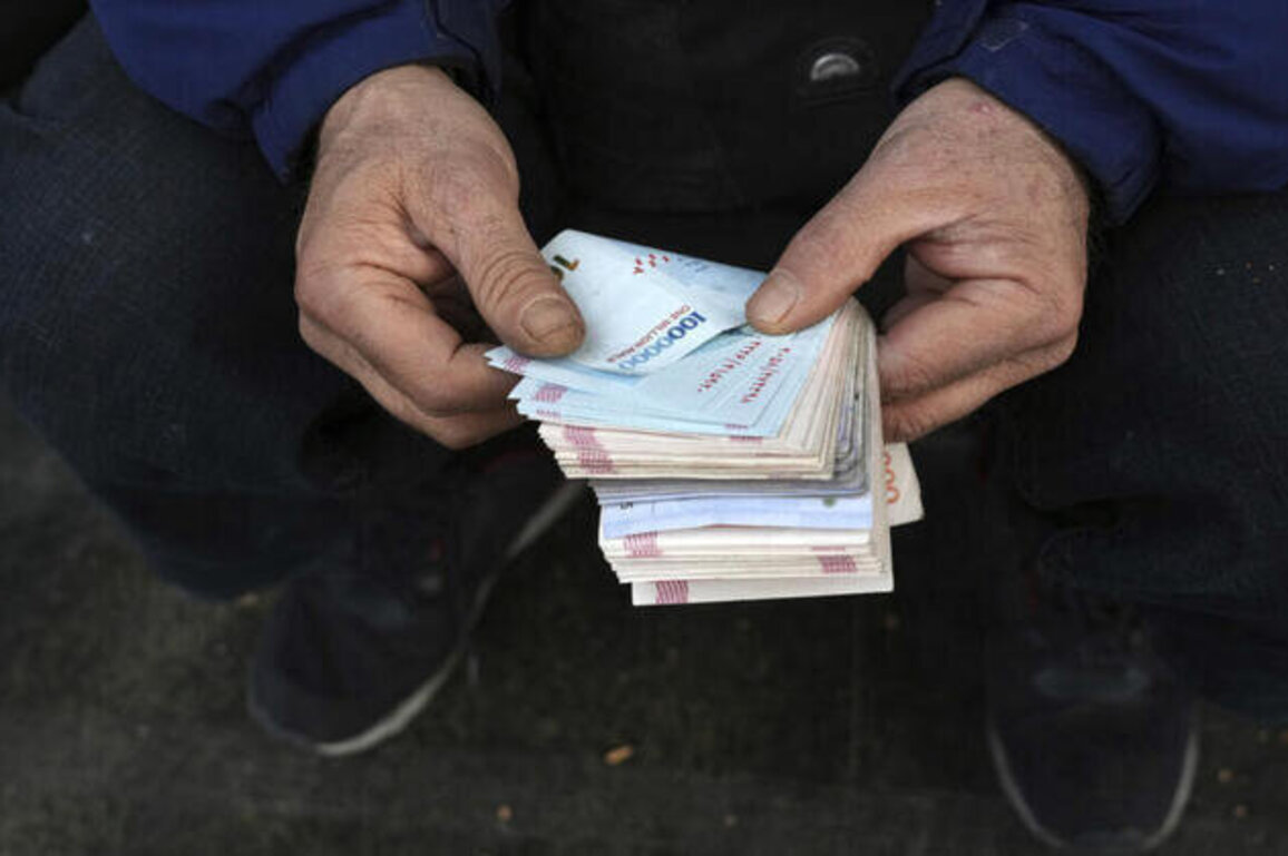 Iranian shopkeepers protest, shut stores as currency hits record low