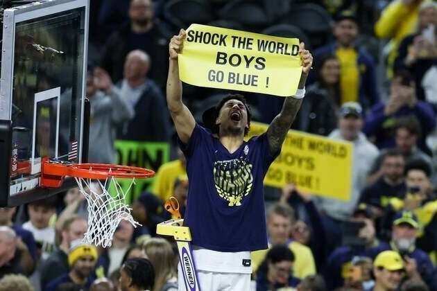 All hail: Michigan outmuscles UConn, claims second national title