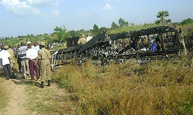Police, army guard wreckage of burnt plane Police, army guard wreckage of burnt plane