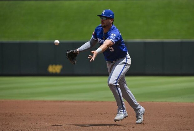 Royals rally for 6-4 win over Cardinals in opener