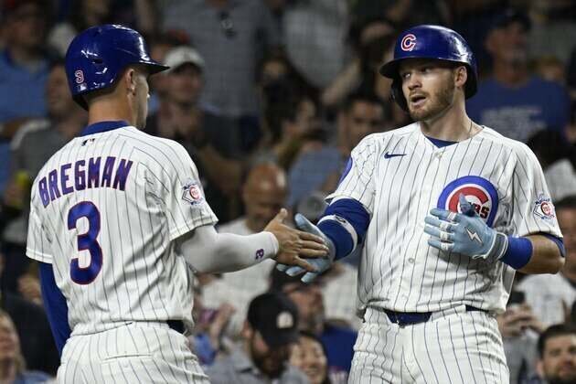Cubs roar back from 5-run deficit, top A's with 4-run 9th