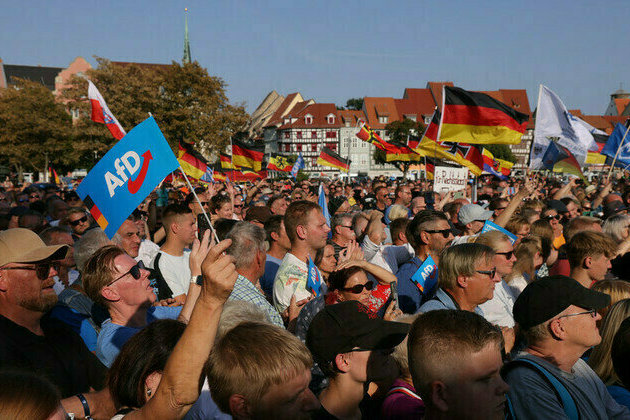 Germanys AfD draws level with Merzs conservatives  poll