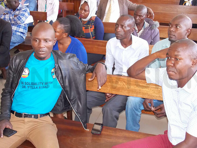  he suspects seated in court before the hearing of their case 