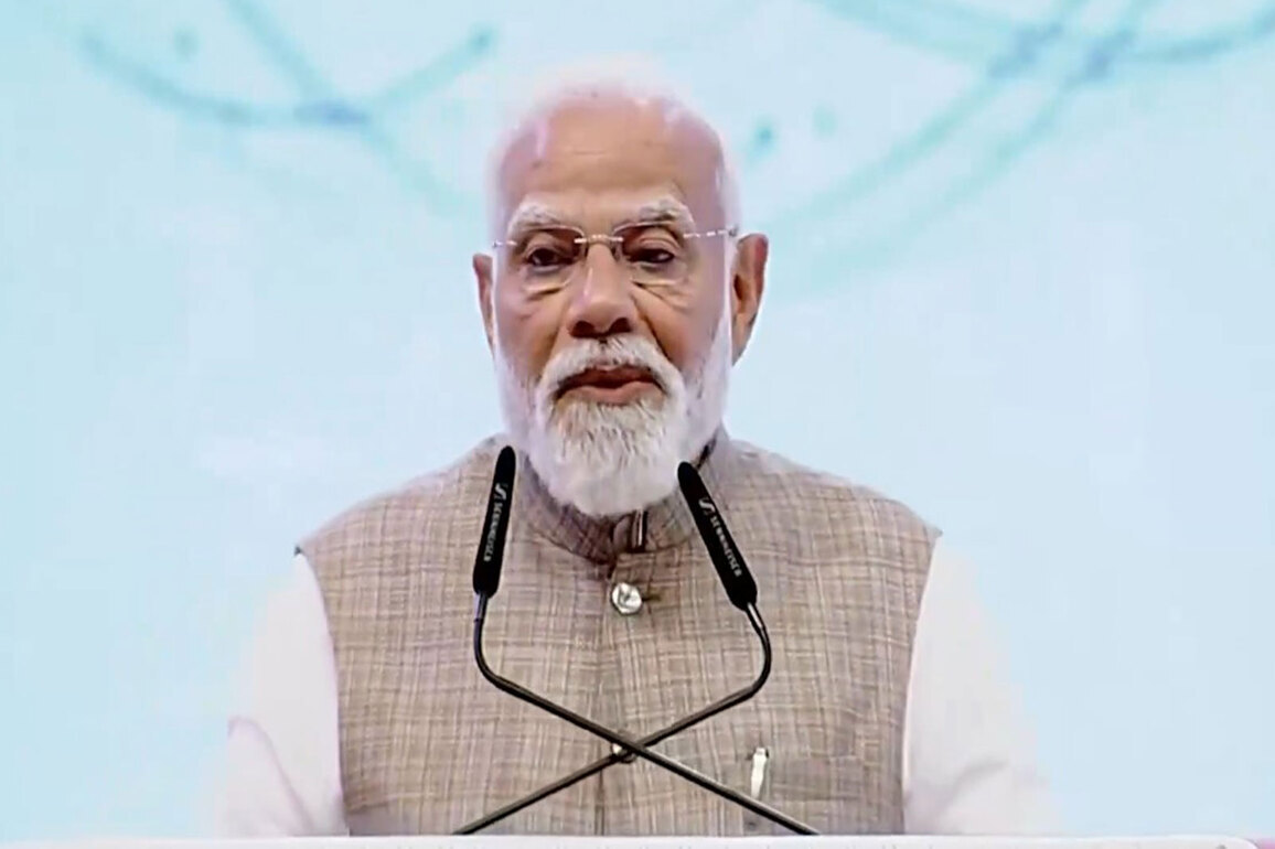 PM Modi distributes land deeds to tea garden workers in Assam