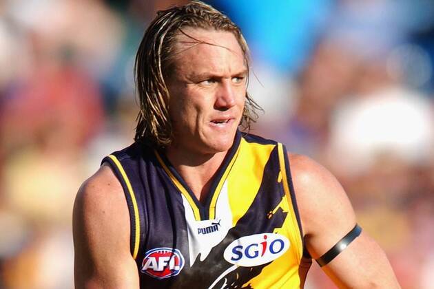 Footy legend with a very chequered past reveals his radically different new look at team reunion