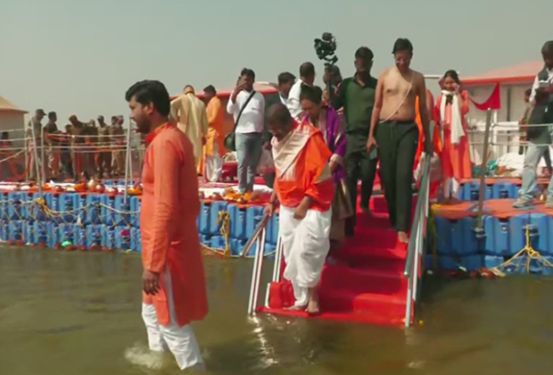 Education Minister Dharmendra Pradhan takes holy dip at Triveni Sangam