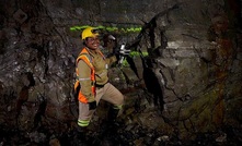  Geologist Micheline Kyenge examines the chalcocite-rich face in Kakula’s northern access drive spiral, which accounts for the high copper grades
