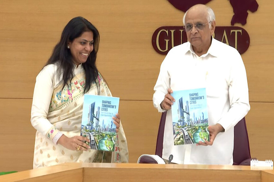 Gujarat CM Patel releases the book "Shaping Tomorrow's Cities -From Climate Risk to Green Opportunities"