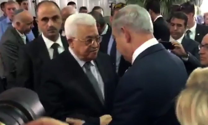 Abbas, Netanyahu shake hands at Peres funeral Abbas, Netanyahu shake hands at Peres funeral