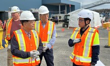POSCO Group chairperson In-hwa Chang (left) inspects the Ultium CAM JV site in Canada