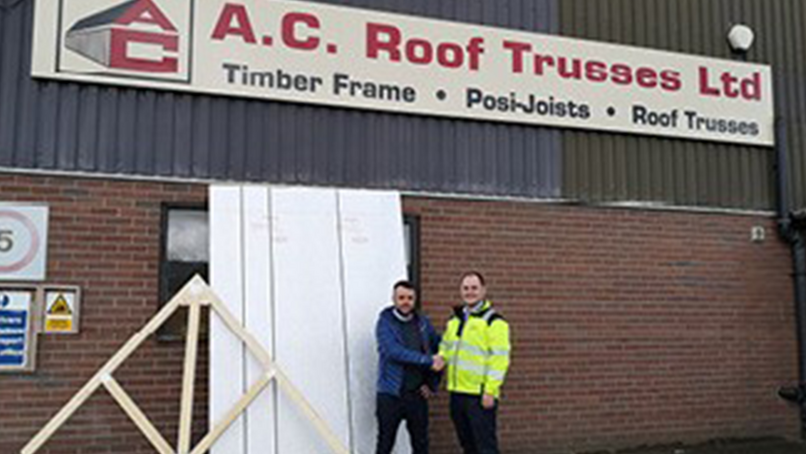 Osian Jones from the Huws Gray Group and Tom Jones from AC Roof Trusses. 