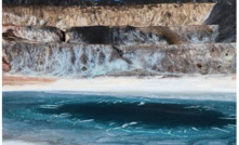 Copper leaching from heaps – blue is copper sulphate. Image taken on September 25, 2022. The solution from the heap has been directed to collect in the drains at the heap front.