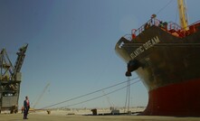 Tim Johnston, president and CEO of Desert Lion Energy, stands near the Atlantic Dream