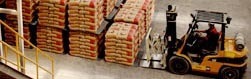 Holcim falls on downgrade