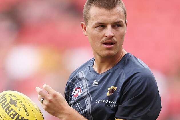 Why footy star is in trouble with the AFL over this seemingly innocent photo