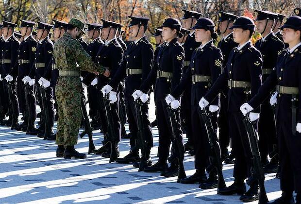 To hurry military build-up, Japan will not cap defense spending