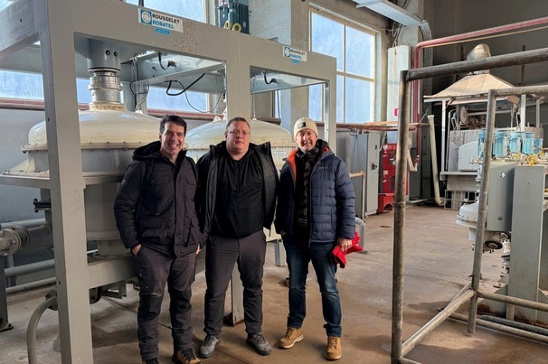 Lindian's Robert Martin and Zac Komur with Sareco COO Vladimir Fedotov (centre)