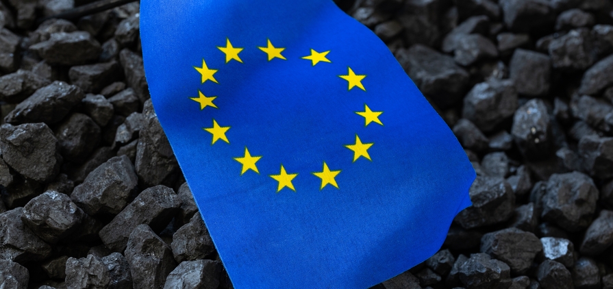 European Union flag against the background of coal