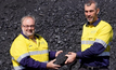  Bowen Coking Coal executive chairman Nick Jorss (right) and CEO Gerhard Redelinghuys with coal to be shipped from the Bluff mine in Queensland.  
