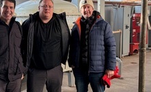 Lindian's Robert Martin and Zac Komur with Sareco COO Vladimir Fedotov (centre)