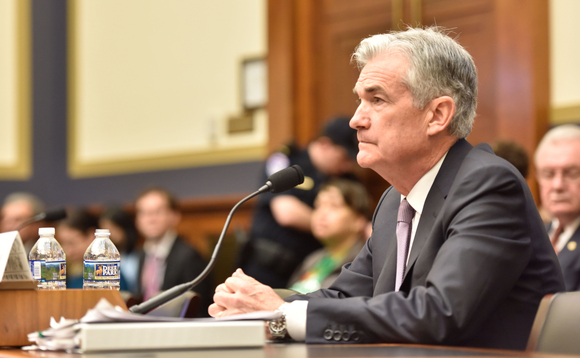 Fed increases interest rates as US inflation hits 14-year high 